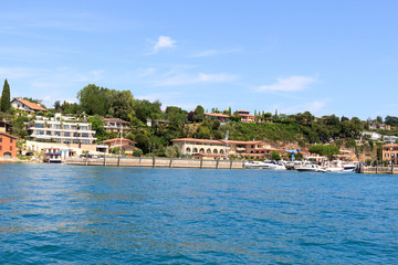 Marina at Lake Garda with houses, Italy
