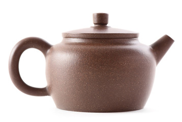 Chinese teaware. Brown clay teapot isolated on white background side view