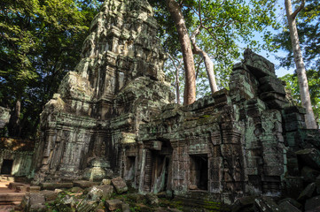 Fototapeta na wymiar Siem Reap, Cambodia - August 5th, 2016:Ta Prohm, part of Khmer temple complex, Asia. Siem Reap, Cambodia. Ancient Khmer architecture in jungle.ia. Ancient Khmer architecture in jungle.