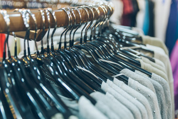 clothes on rack close up in store. shopping concept