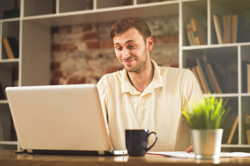 Young man with a laptop