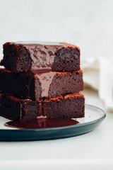 Chocolate brownie with chocolate syrup. American dessert. 