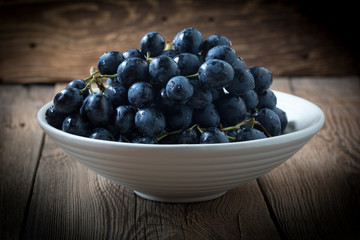 Dark grape in bowl.