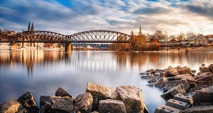 Beautiful sunset view on Vysehrad church of st Peter and Paul. Panorama of castle.