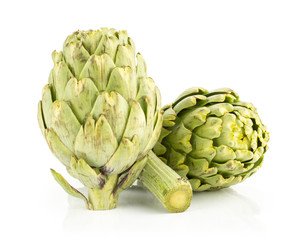 Fototapeta premium Three globe artichoke isolated on white background fresh raw.