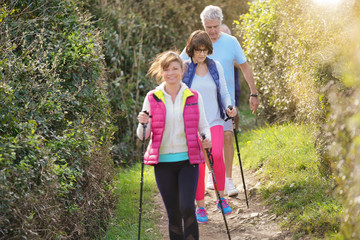 Senior people nordic walking by the atlantic coast