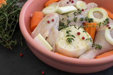 Raw chicken in the marinade with spices