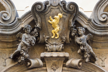 Fototapeta na wymiar Architectural decoration of building in Prague, Czech Republic