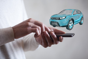 man hand smart phone with car in screen