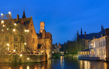 Fototapeta premium Twilight view of historic medieval centre of Bruges (Brugge), Belgium in Christmas decorations