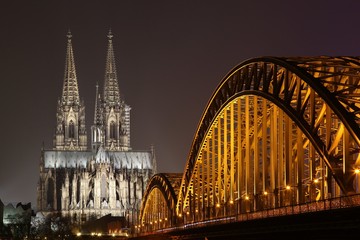 Cologne Cathedral and Hohenzollern Bridge by night, Germany