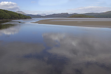 River mouth with reflections of the sky