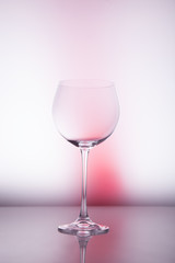 Wine glass blank on colorful abstract background.