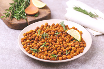 Indian cuisine. Roasted chickpeas with lime and rosemary
