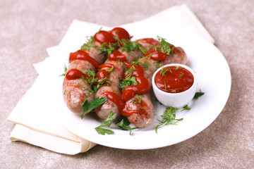 Grilled sausages with lime on iron grill pan