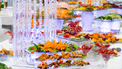 buffet: snacks and salads are on the table.