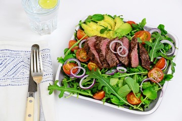 Steak salad on the white background. Steak salad isolated. Top view