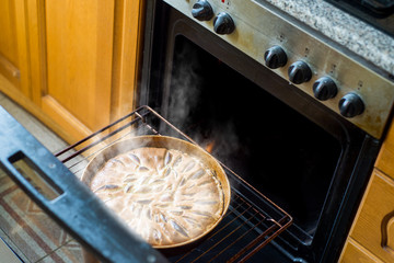 Apple pie in an oven