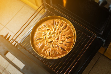 Apple pie in an oven