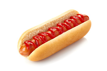 Hot dog with ketchup on white