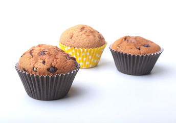Homemade muffin with raisins and chocolate cupcake. selective focus