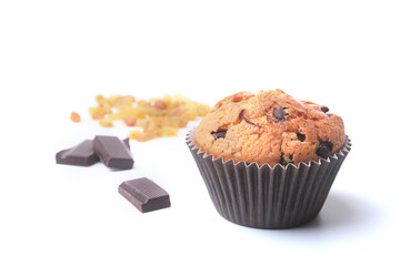 Homemade muffin with raisins and chocolate cupcake. selective focus