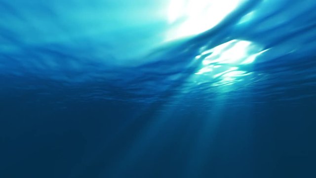 blue ocean surface seen from underwater, looped slow motion waves and beams, rays of sunlight shining through, 4K seamless loop 