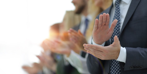 blurred image of business team applauding - obrazy, fototapety, plakaty