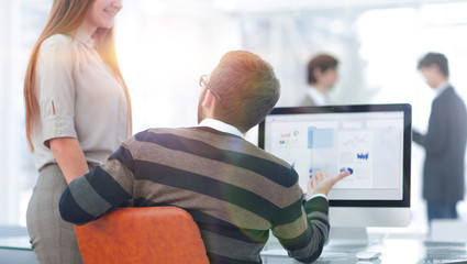 employees analyze marketing scheme