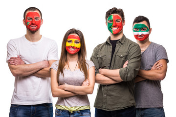 Group of people supporters fans of national teams painted flag face of Portugal, Spain, Marocco,...