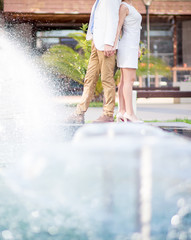 Bride and groom near the pool