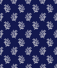 Indigo dye woodblock printed seamless ethnic floral all over pattern. Traditional oriental ornament of India, flowers of Kashmir, ecru on navy blue background. Textile design.