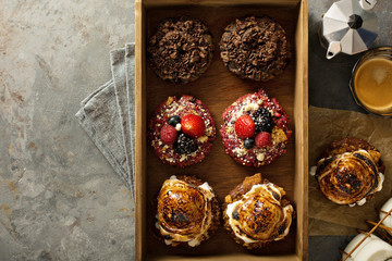 Variety of donuts in a wooden box