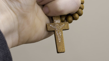 my last rescue - hand with wooden rosary - obrazy, fototapety, plakaty