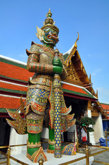 Fototapeta na wymiar Giant Mosaic Figure Guards the Temples at the Grand Palace.