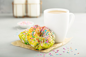 Unicorn donuts with coffee