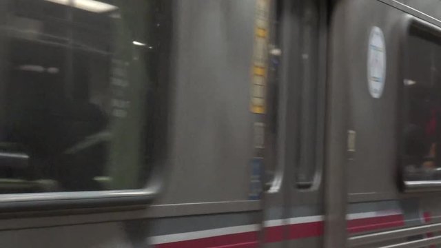 A subway train approaching close up