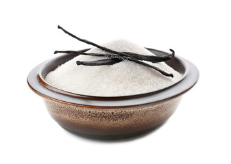 Bowl with vanilla sugar and sticks on white background