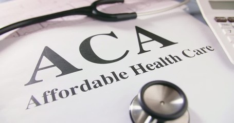 Stethoscope And ECG Report With ACA Text On Document