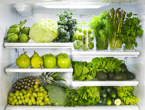 Fresh Green Vegetables And Fruits In Fridge.