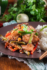 Kung Pao chicken with peppers and vegetables