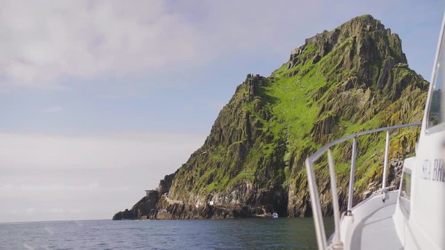 Boat Moving Towards Skellig Michael Island Against Sky