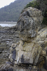 Fototapeta na wymiar Unusual shaped beach rock