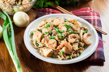Fried rice with shrimp and vegetables served on a plate