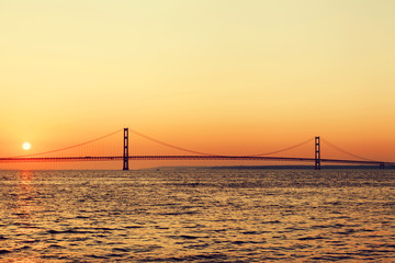 Fototapeta na wymiar Long Bridge On Summer Sunset