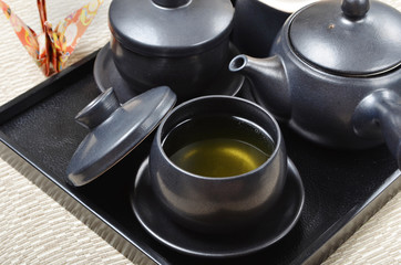 Japanese style tea set  in a wooden tray