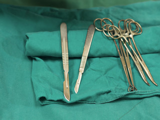 Sterile surgical tools or equipments, surgical incision blade, knife, scissors, clamps and needle...