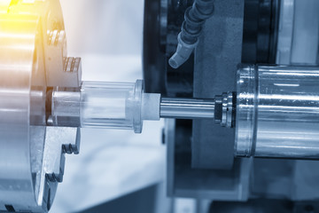 The CNC lathe machine attach the grinding tool for inside grinding process.