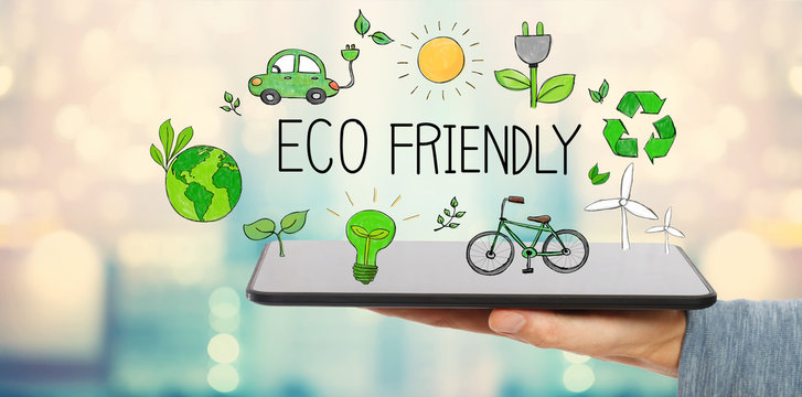Eco Friendly with man holding a tablet computer