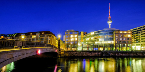 Berlin Tower cityscape on the Spree River in twilight during blue hour at dusk, Germany